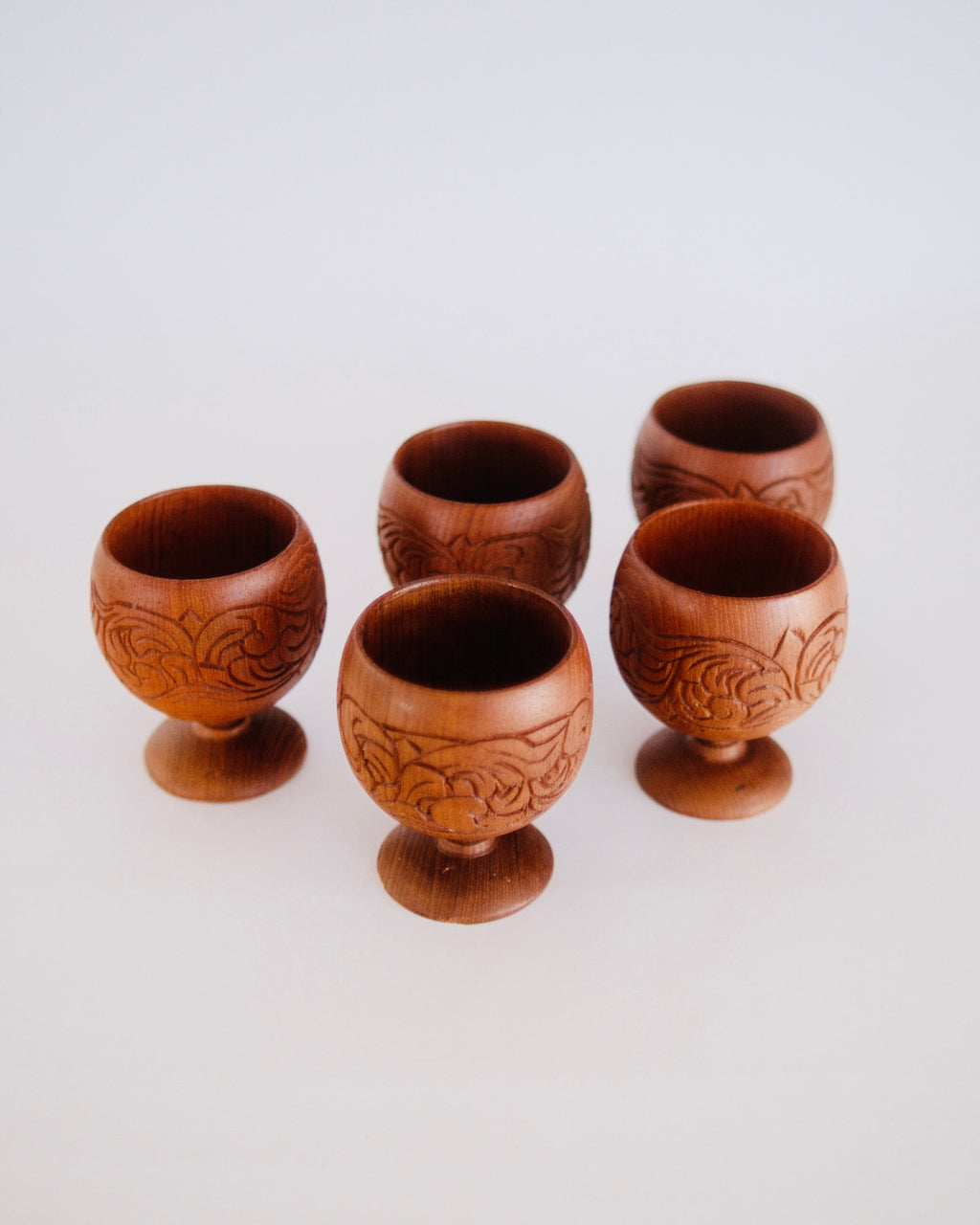 Set of five mid-century hand-carved teak wood goblets with floral relief carving - Eulogy Vintage