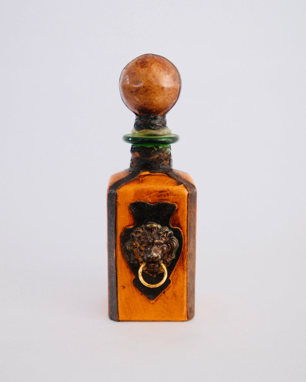 The Sovereign Decanter | Mid-Century Italian Leather Bottle with Brass Lion Knocker