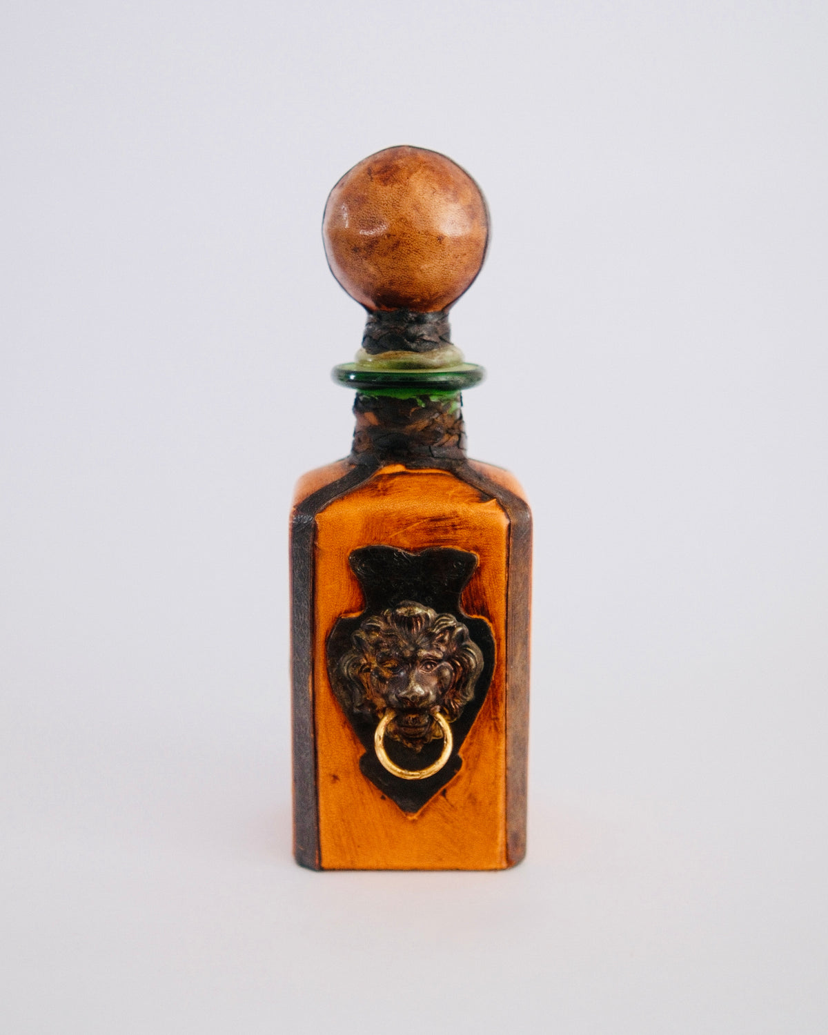 The Sovereign Decanter | Mid-Century Italian Leather Bottle with Brass Lion Knocker