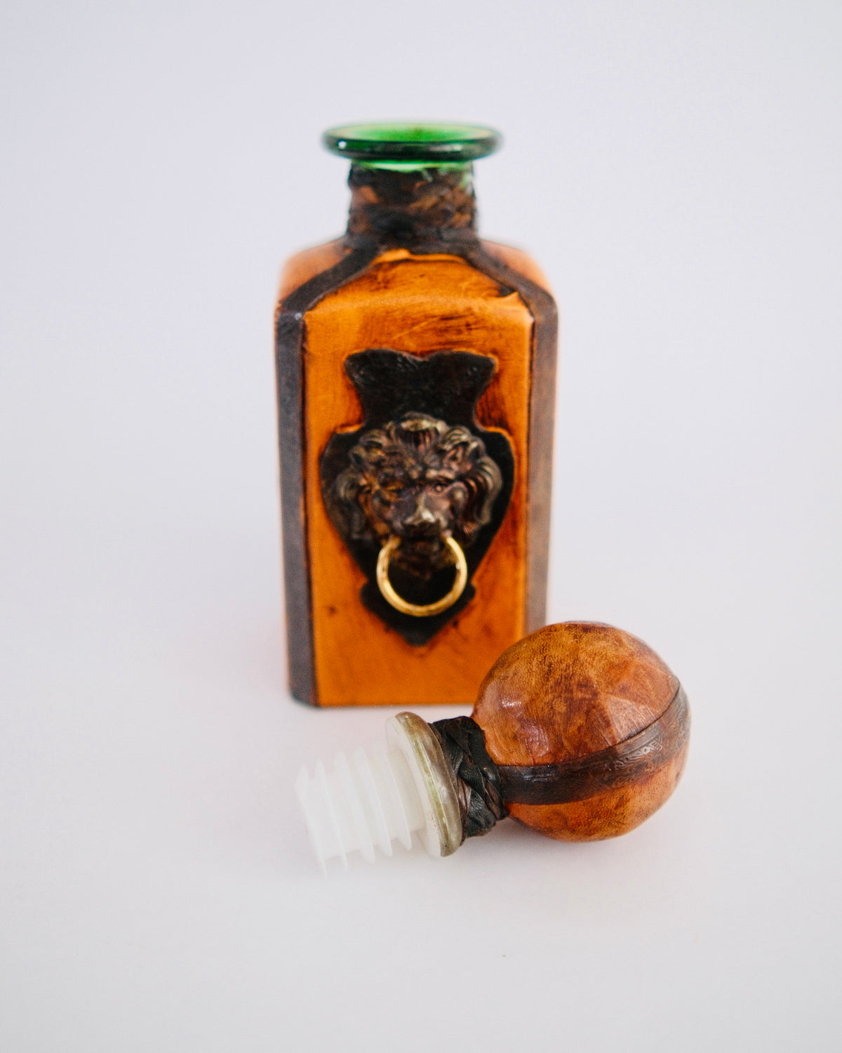 The Sovereign Decanter | Mid-Century Italian Leather Bottle with Brass Lion Knocker