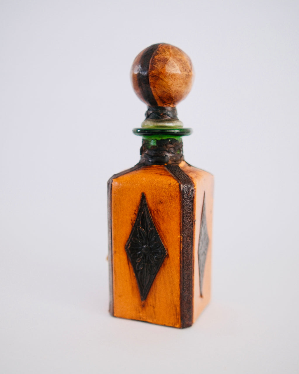 The Sovereign Decanter | Mid-Century Italian Leather Bottle with Brass Lion Knocker